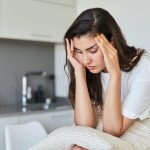 Portrait of a young woman with anxiety and depression problems